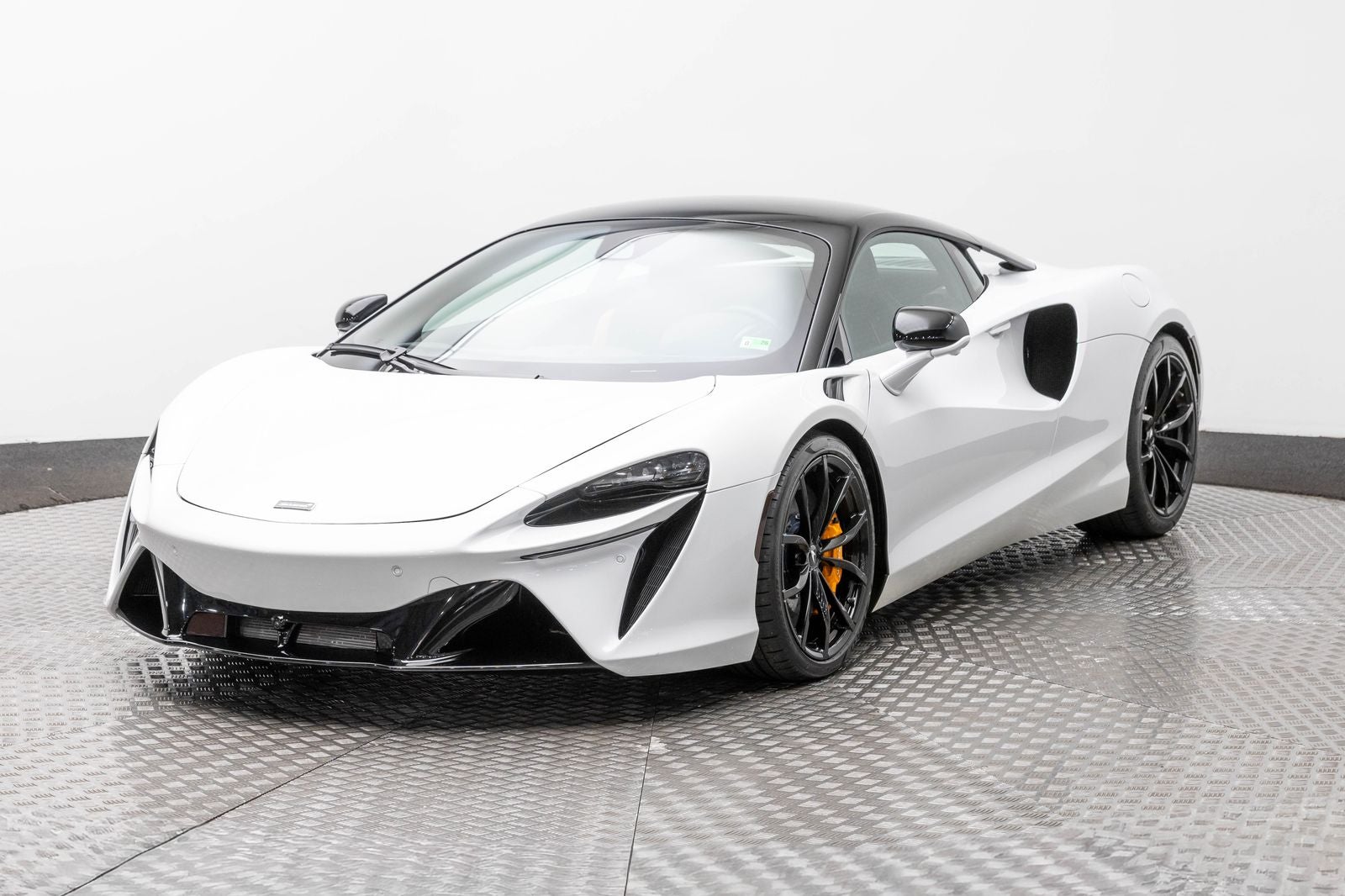2023 McLaren Artura Coupe in White — front three-quarter view